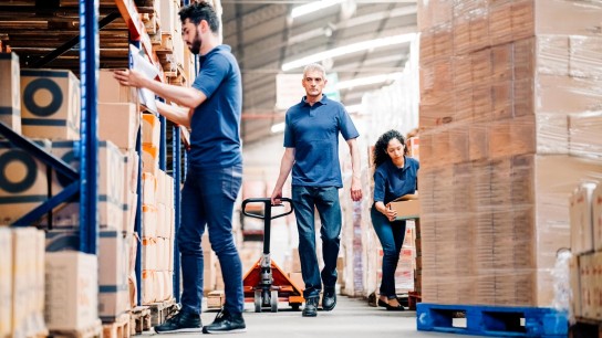 Warehouse staff sorting parcels 