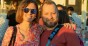 Een man en vrouw met zonnebril op het Unite zomerfeest